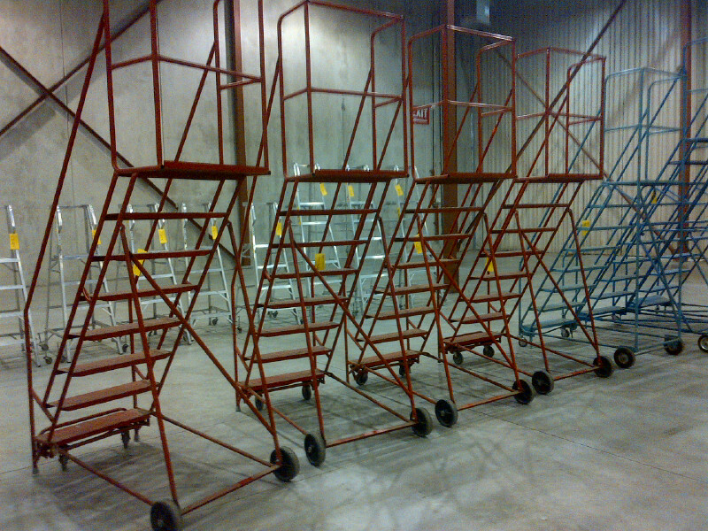 lot of used rolling ladders